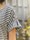 Top en jersey manches courtes avec pattes de boutonnage